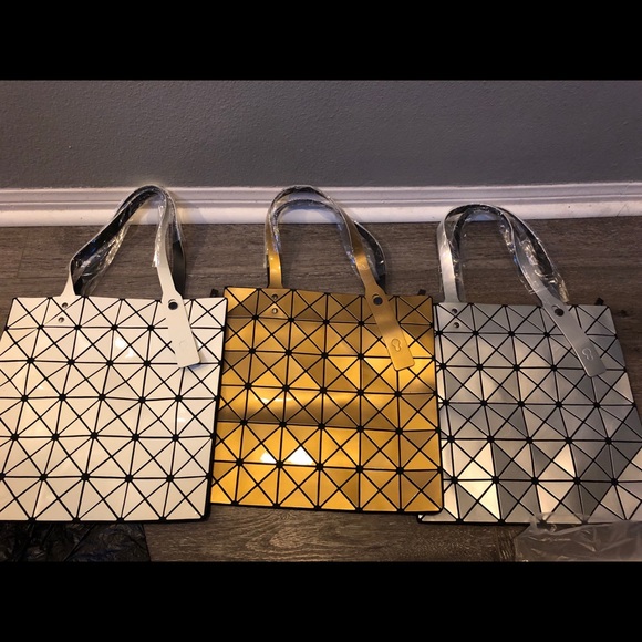 Handbags - Purses- one white one silver and one gold. SOLD